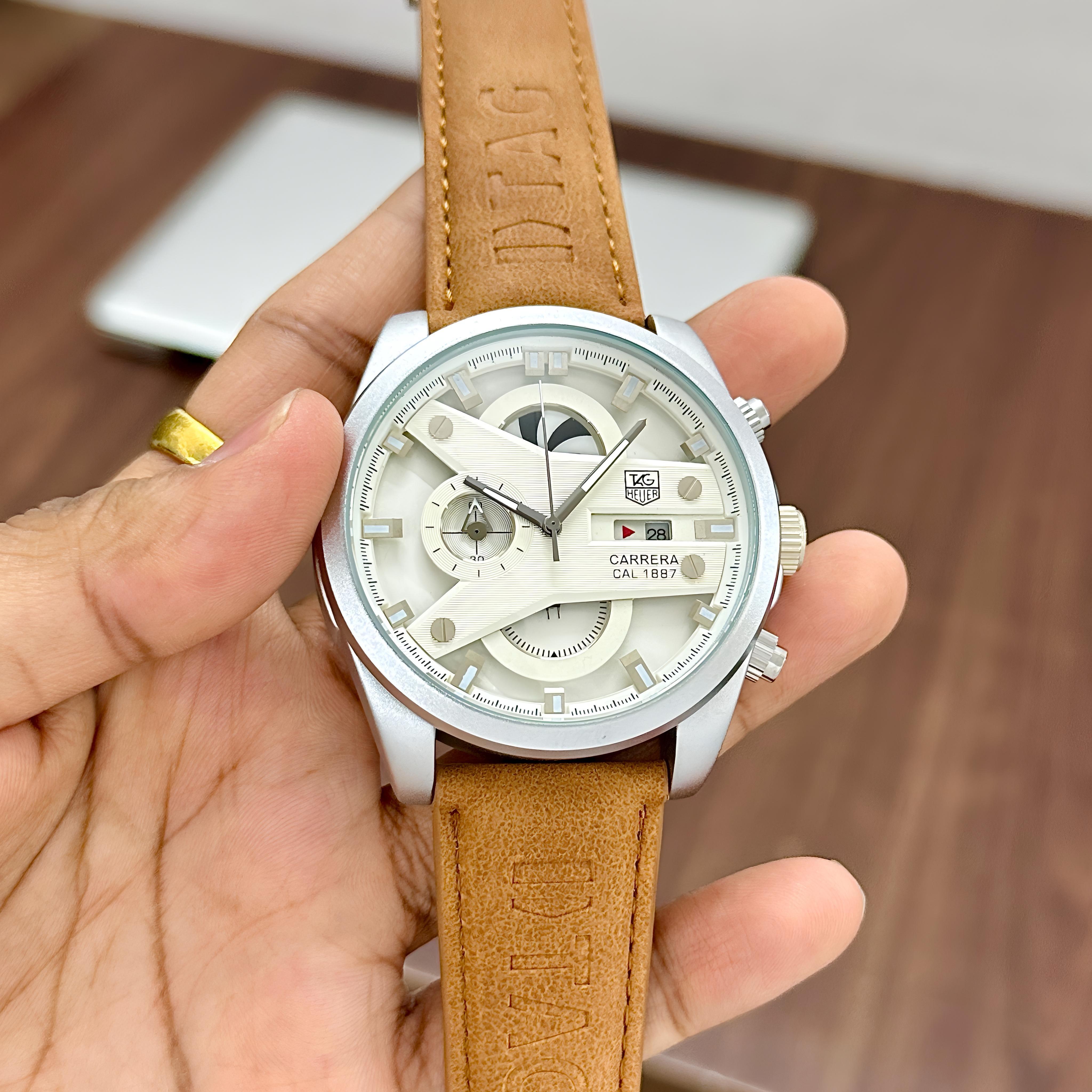 Tag Heuer For Men  Sporty Triple Chronograph dial looks - Classy Wheel rotating seconds