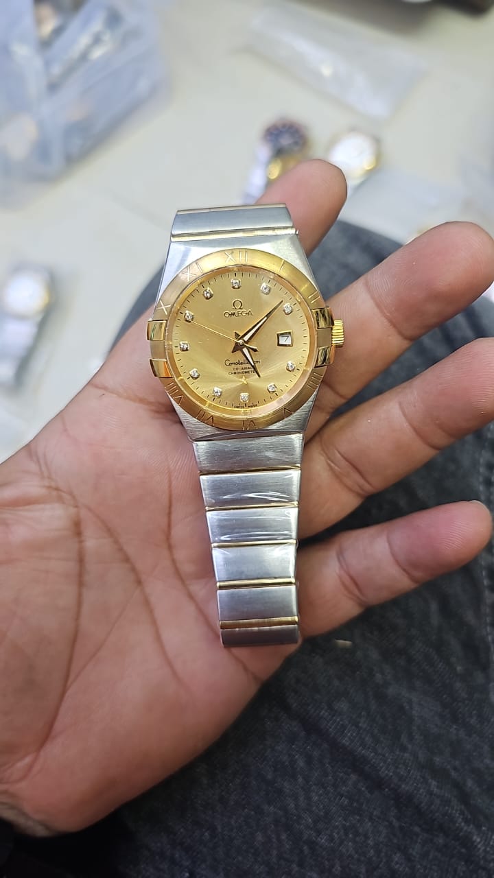 Omega constellation automatic champagne dial men's watch
