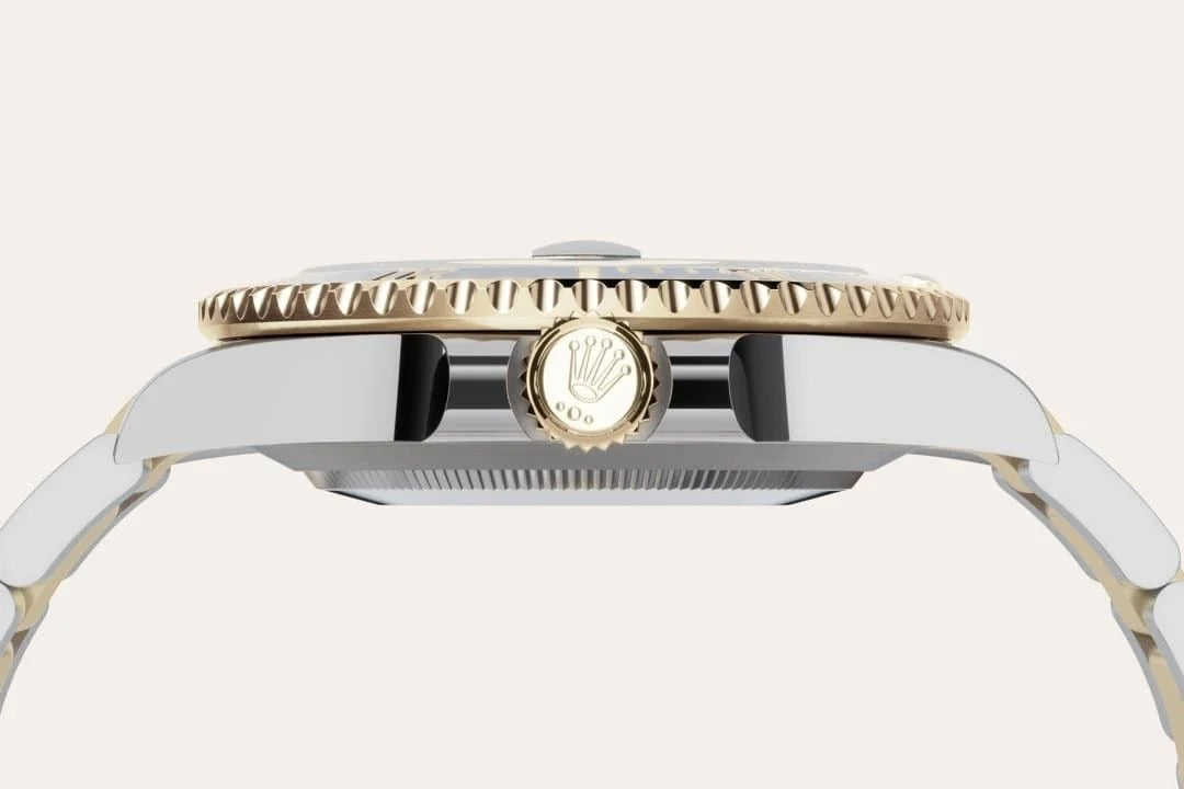 Rolex Submariner Date Oyster, 41 mm, Oystersteel and yellow gold (GOLD- SILVER- BLUE)