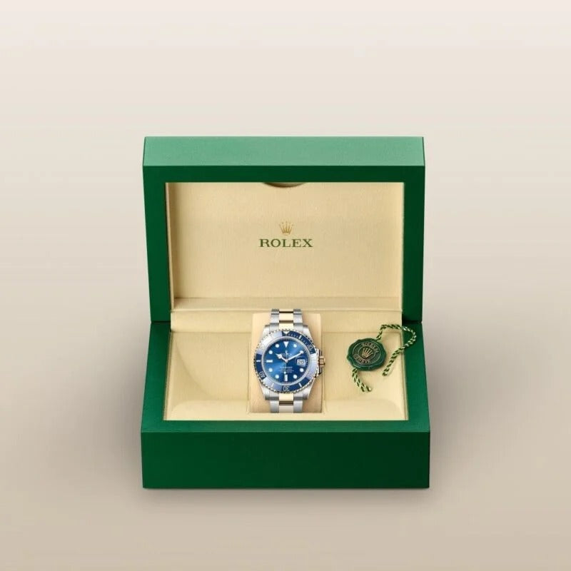 Rolex Submariner Date Oyster, 41 mm, Oystersteel and yellow gold (GOLD- SILVER- BLUE)