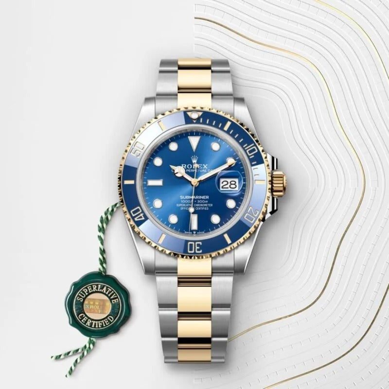 Rolex Submariner Date Oyster, 41 mm, Oystersteel and yellow gold (GOLD- SILVER- BLUE)